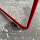 Red powder-coated steel Omstak chair by Rodney Kinsman for Bieffeplast — 1980 industrial design