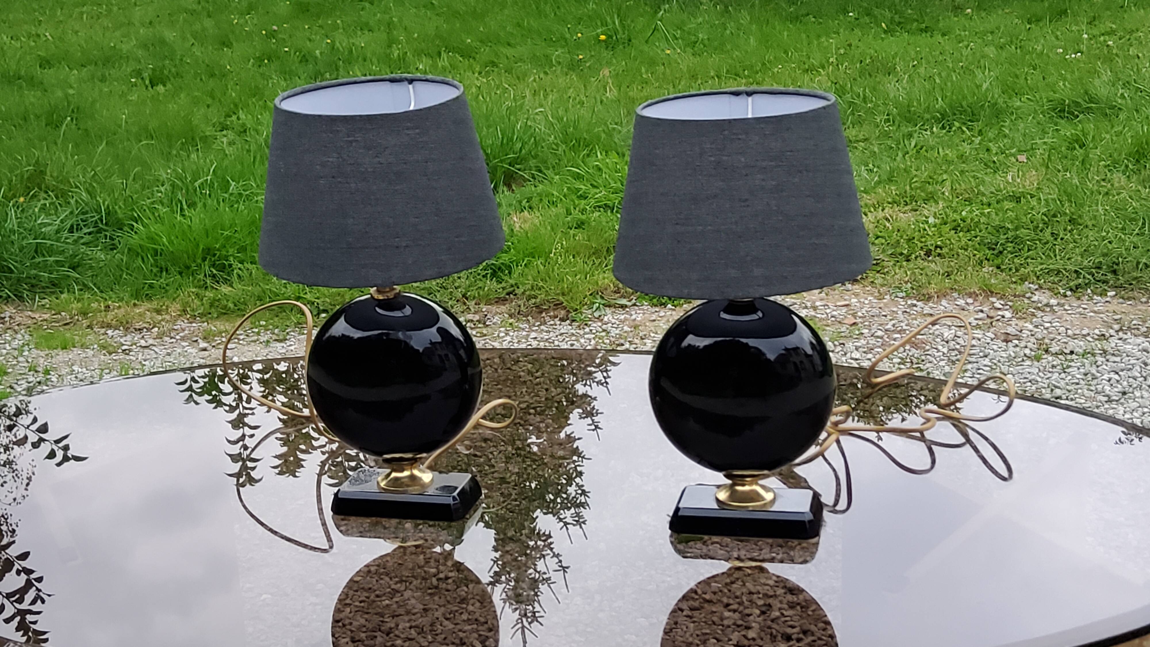 Pair of 70s designer lamps in black ceramic and gold metal