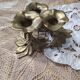 Brass flower candle holder