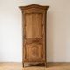 Antique wardrobe in classic style made of solid wood.