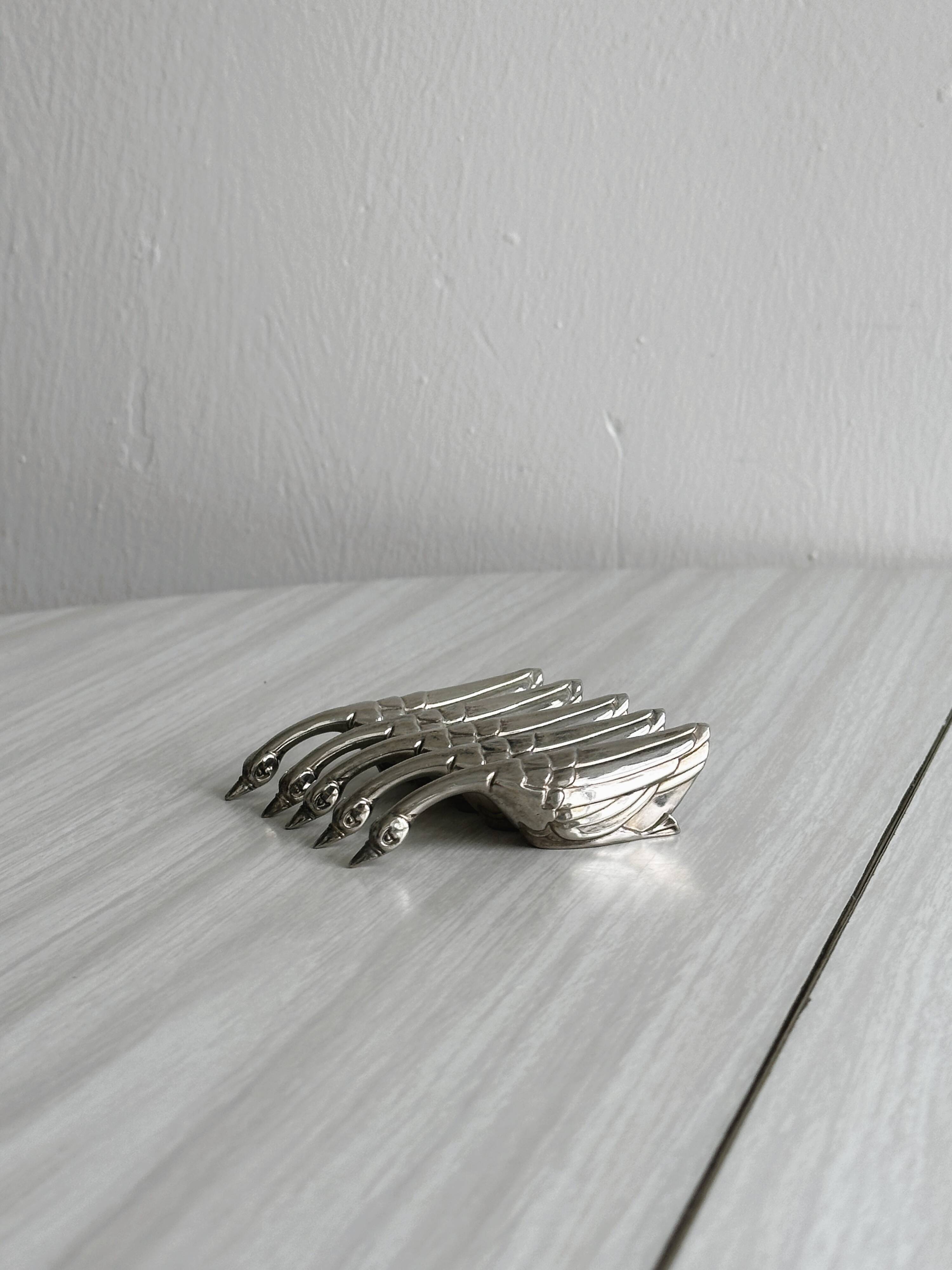 Set of 5 antique goose-shaped knife rests