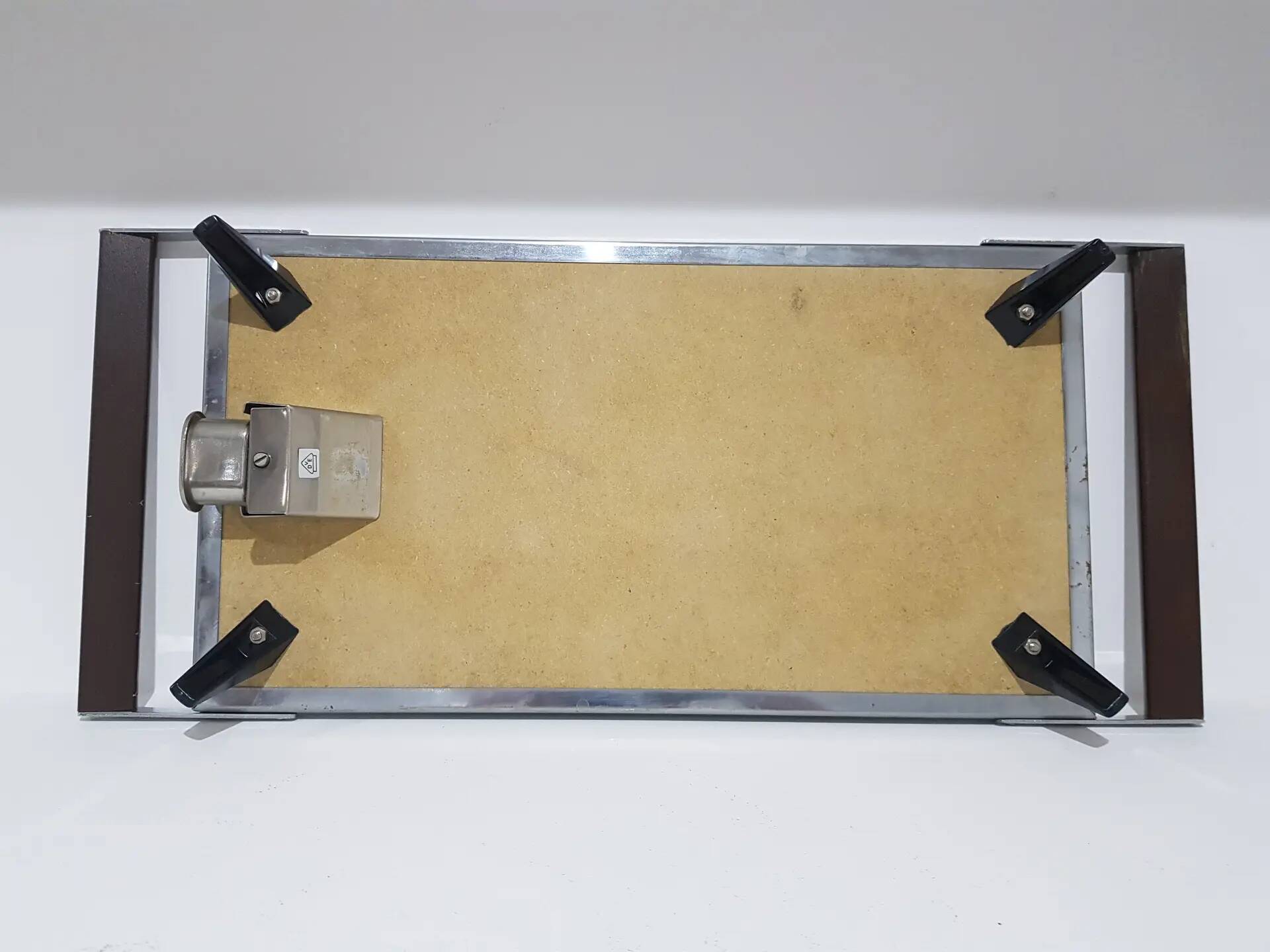 Heating plate, blue and white ceramic, brown rosewood, black metal, Germany, 1970s.