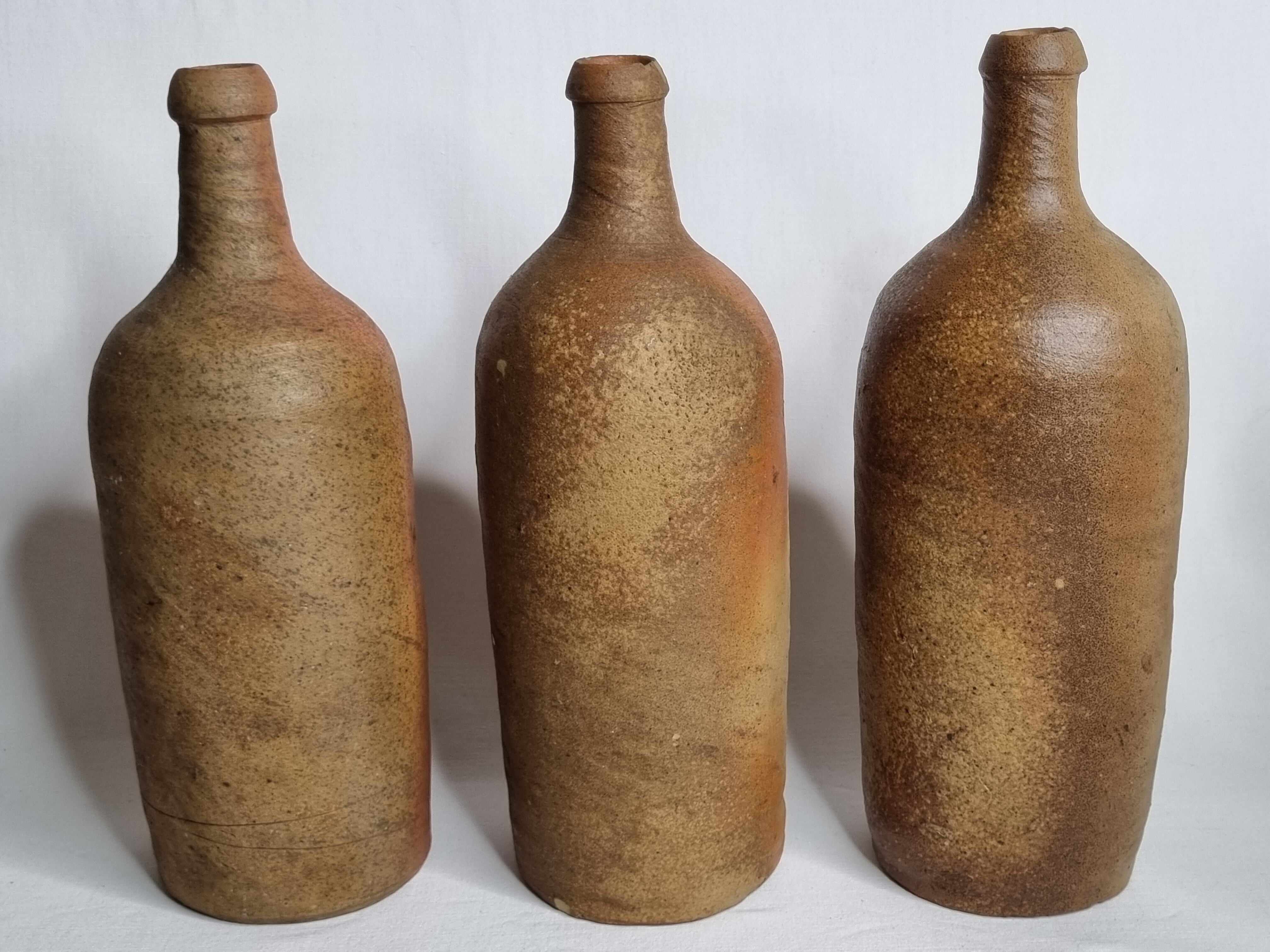 Set of 6 hand-turned stoneware bottles, 31 cm