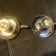 Pair of silver metal hand candle holders
