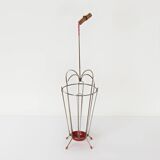VINTAGE UMBRELLA STAND OF CURVED METAL, RED DETAILS AND A BAMBOO HANDLE, 1950S