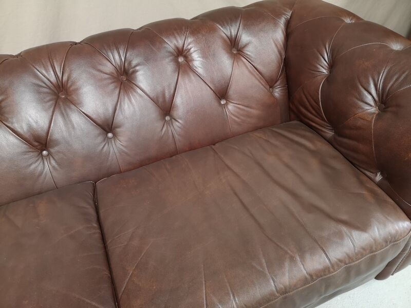 Three seater brown leather chesterfield sofa