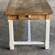 Farm table in solid oak - white patinated legs and its bench.