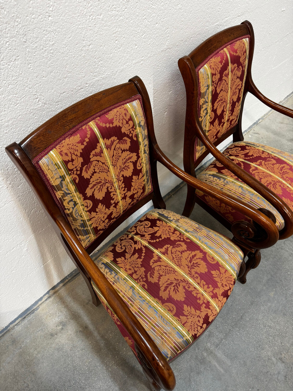 Pair of cross-back armchairs, Empire style, 19th century.