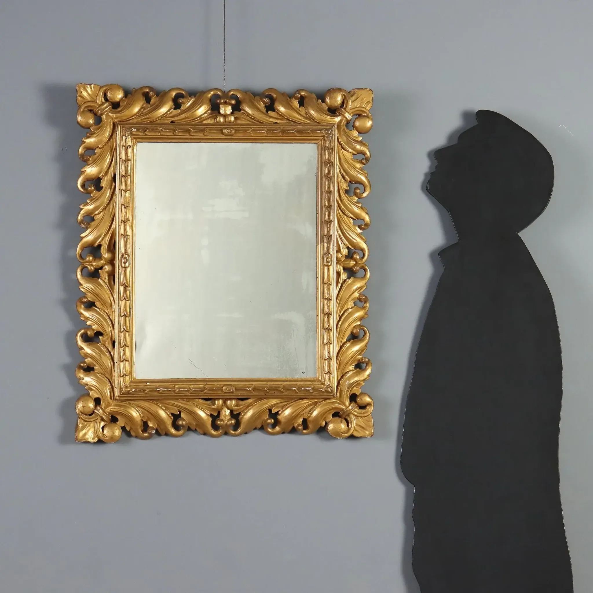Eclectic antique mirror in carved and gilded wood, Italy, 20th century