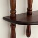 Turned wood wall shelf