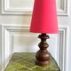 Turned wood lamp with vintage cone shade