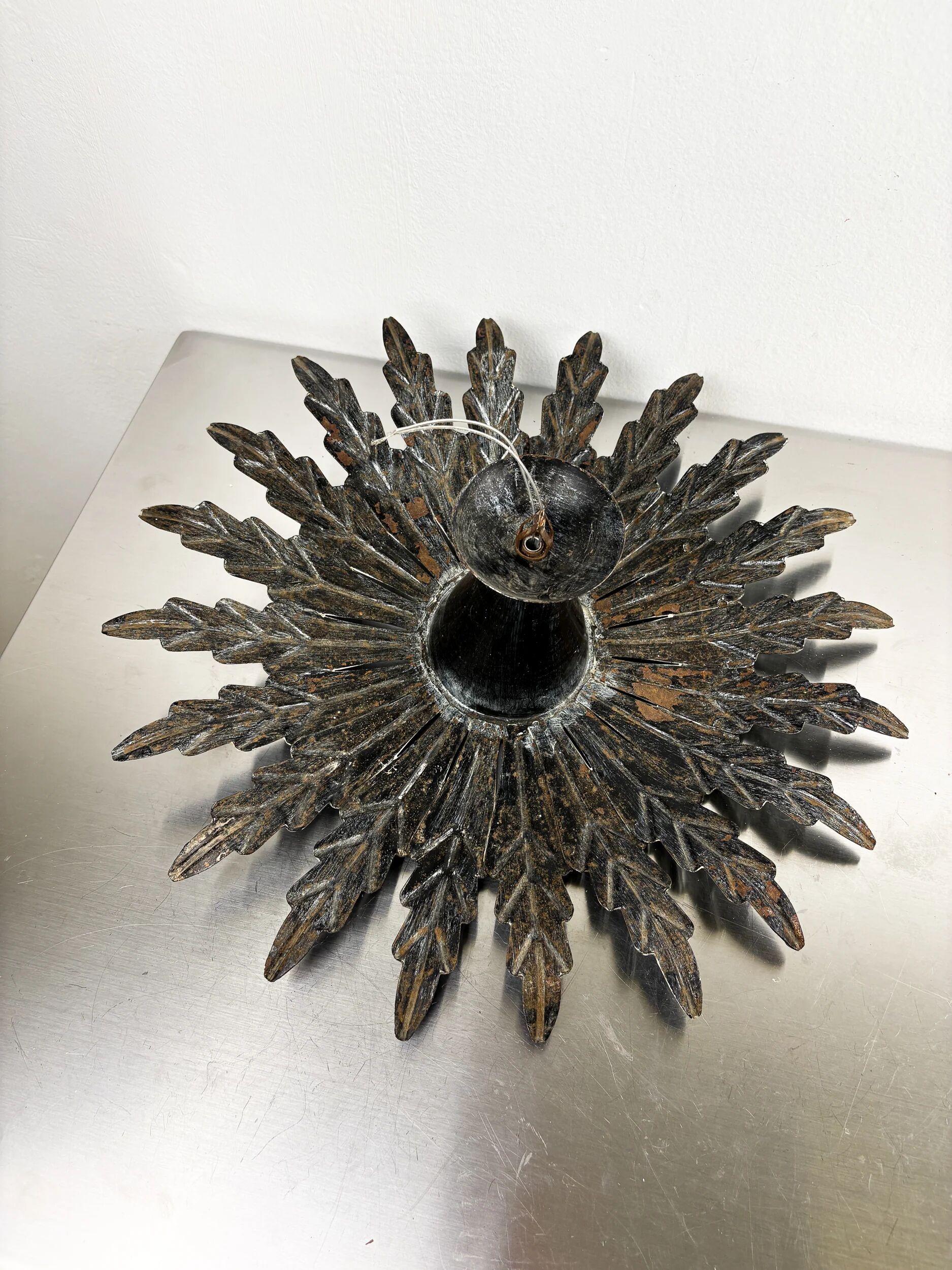 Spanish sunburst ceiling light – dark gilt metal rays, 1950s