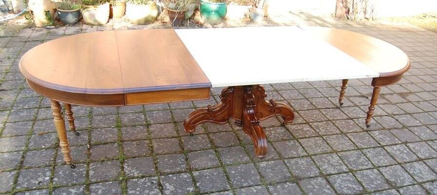 Napoleon III walnut table with central leg and 3 extensions, 14 place settings, late 19th century