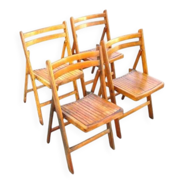 A set of 4 vintage folding wooden chairs, 1970s.