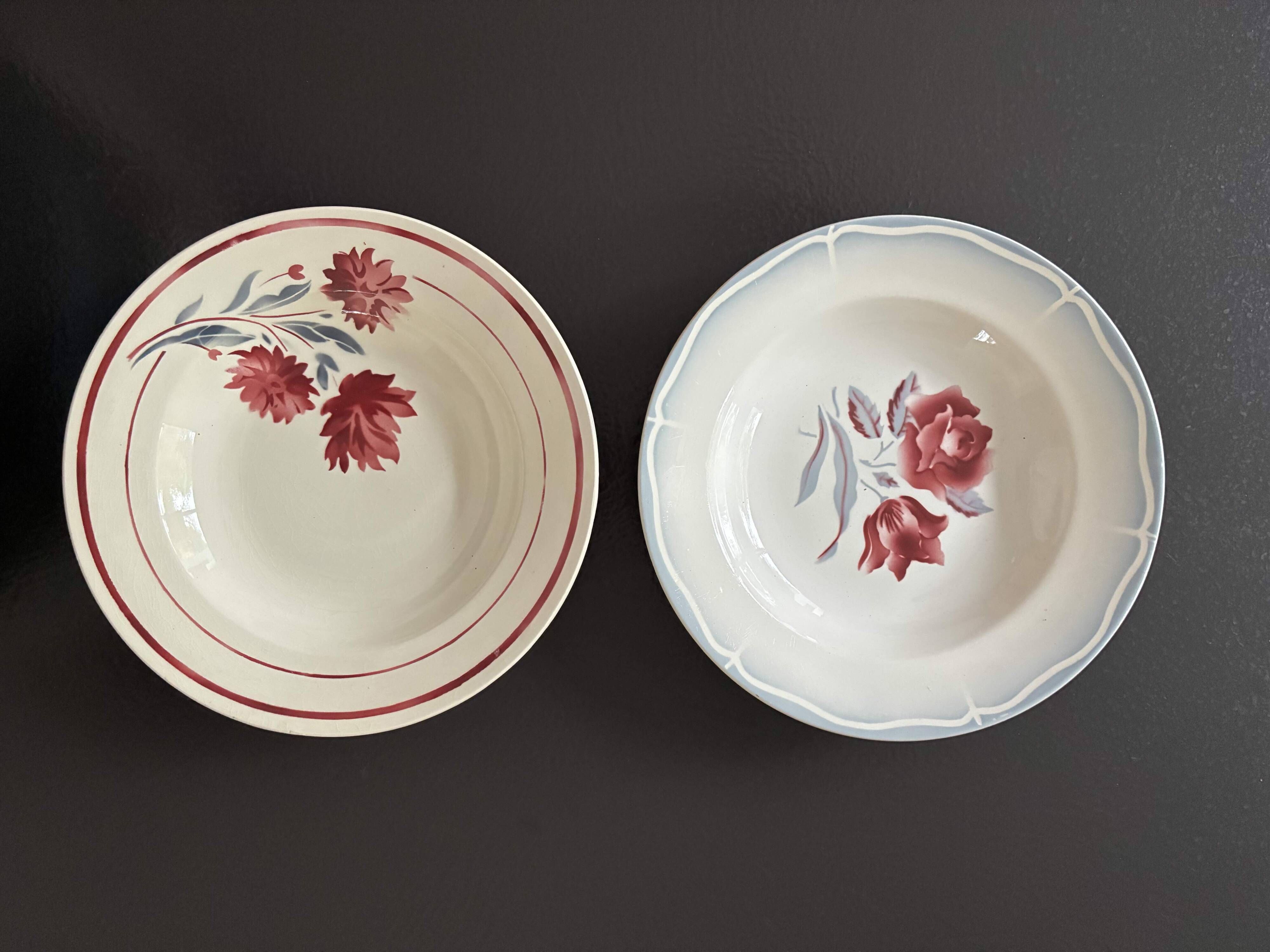 Set of 2 antique deep plates with red flower pattern.