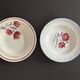 Set of 2 antique deep plates with red flower pattern.