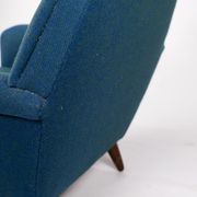 Armchair upholstered with dark blue wool fabric and legs in dark wood, of danish design, 1960s