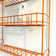 Orange industrial wall shelf
