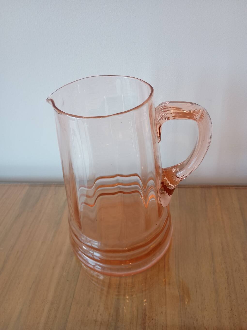 Vintage pink glass water carafe from the 1970s.