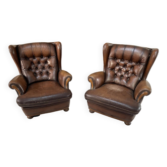 Pair of Chesterfield armchairs with wings in brown leather and upholstery
