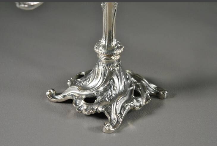 Pair of three-armed silver-plated metal candelabras