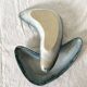 Pair of boomerang dishes signed in enamelled terracotta