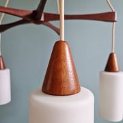 Large Scandinavian chandelier in teak and tubular white opaline, 1960.