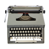 Remington travel-deter Deluxe typewriter with  case