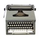 Remington travel-deter Deluxe typewriter with  case