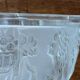 Art Deco bowl, 1930, in pressed molded glass, decorated with a woman and fruit