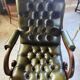 Pair of tufted leather armchairs in Chesterfield / English club style.