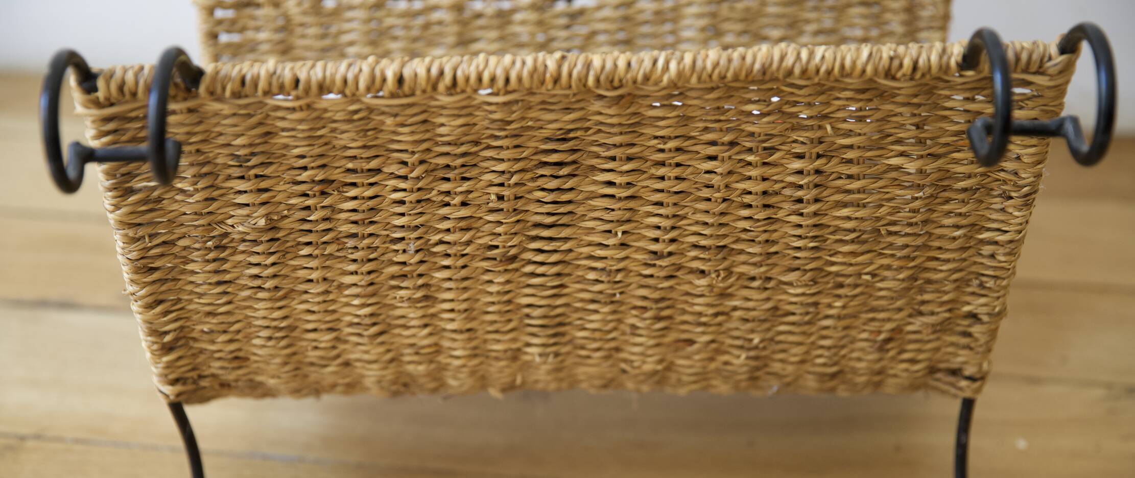 wicker and wrought iron magazine rack