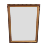 Old wooden and gilded stucco frame