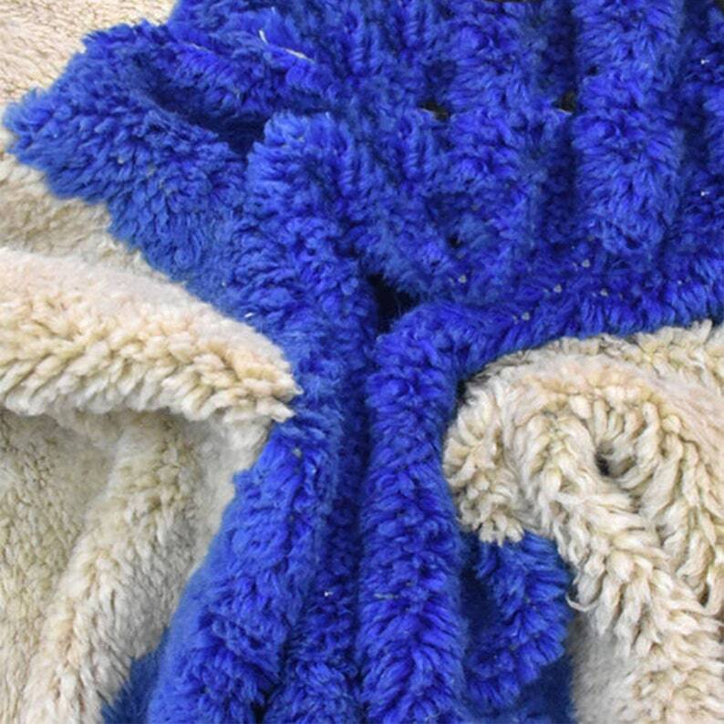 Handmade pure wool rug in blue and white, size 150/250 cm.