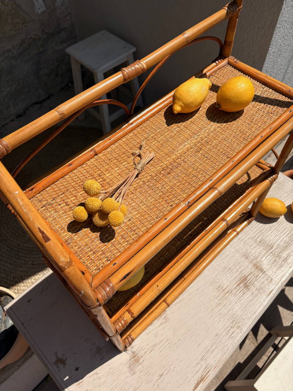 Vintage wall shelf in rattan