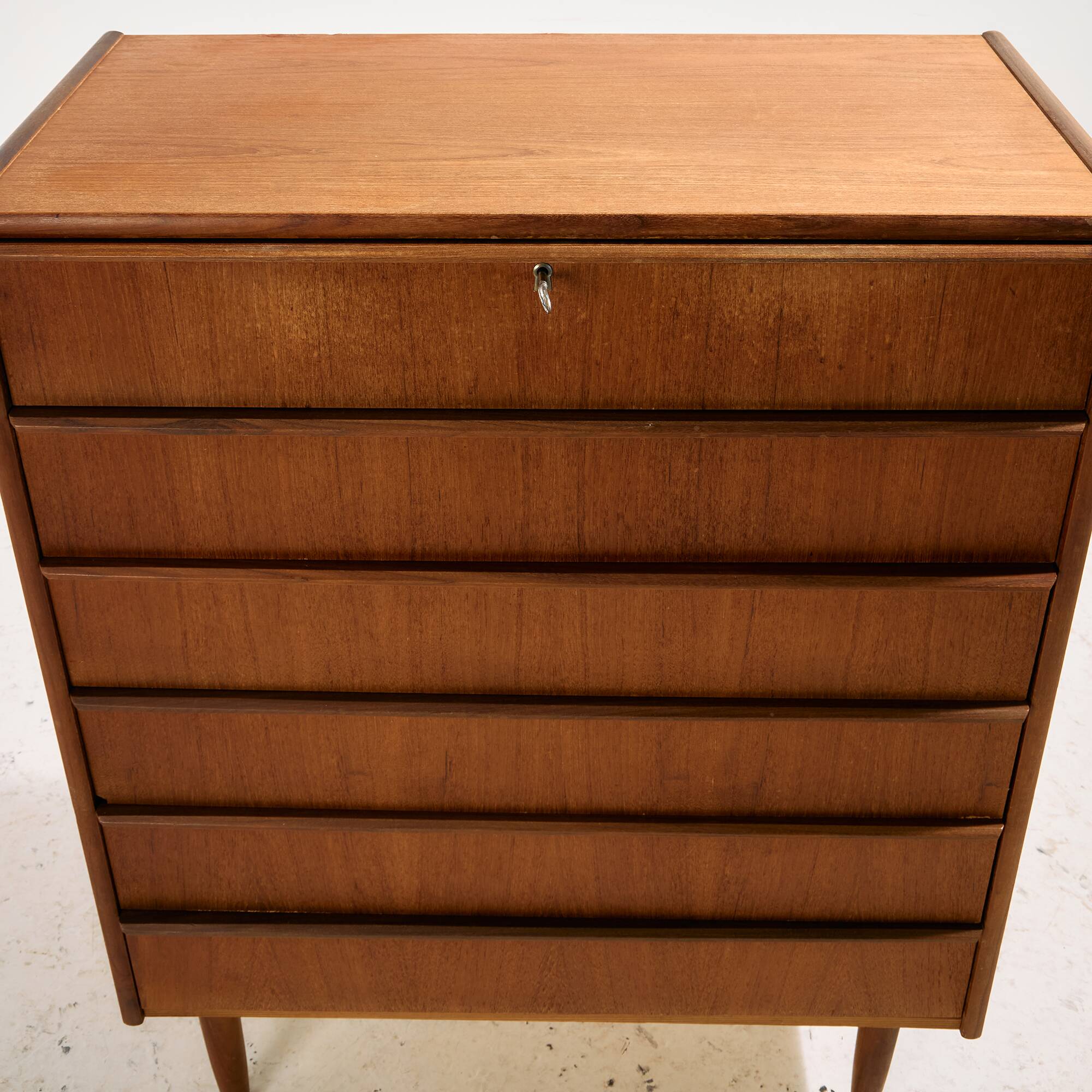 Teak dresser with six drawers