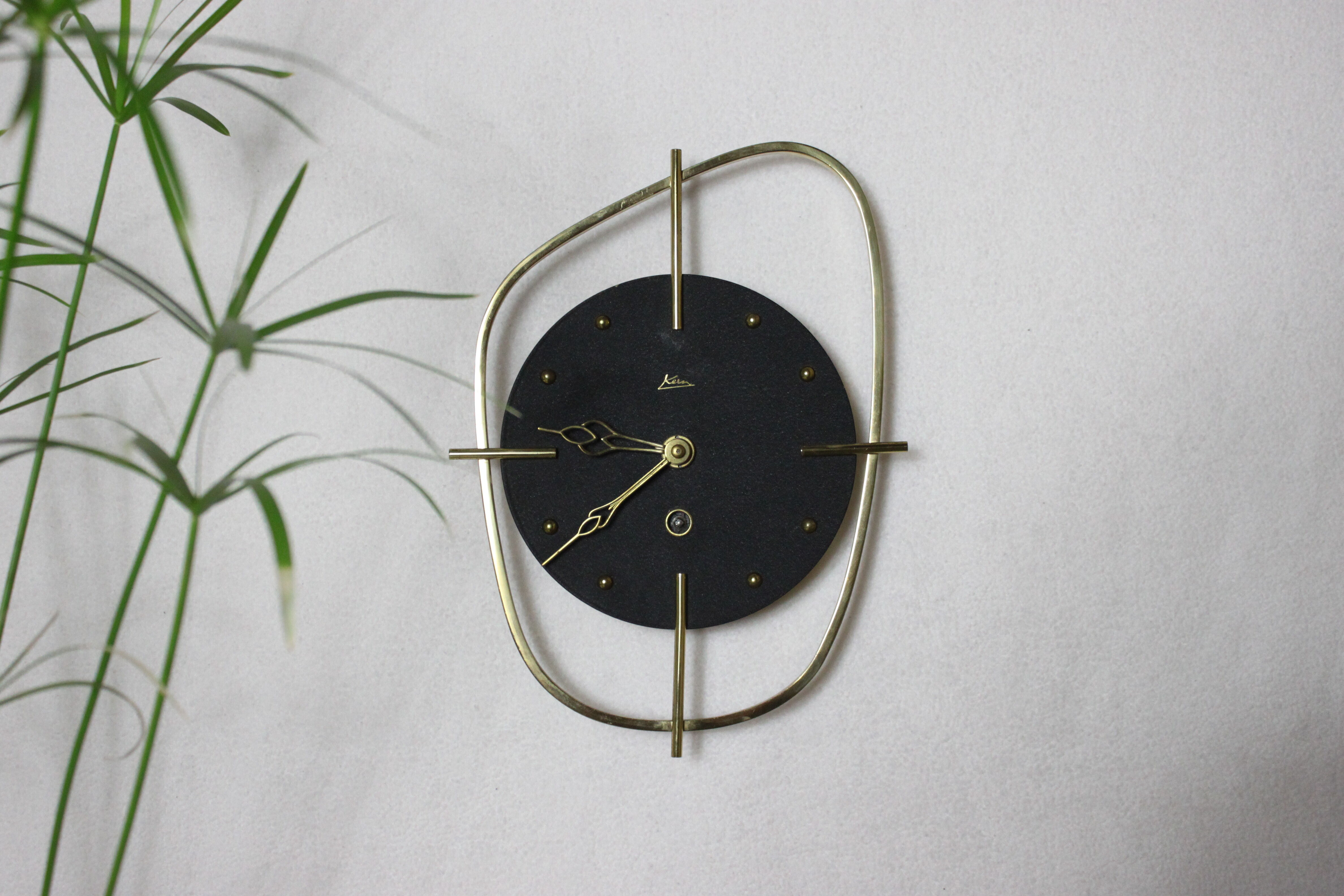 Sputnik clock in vintage brass 50s