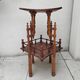 Antique pedestal table in Asian Japonese style.