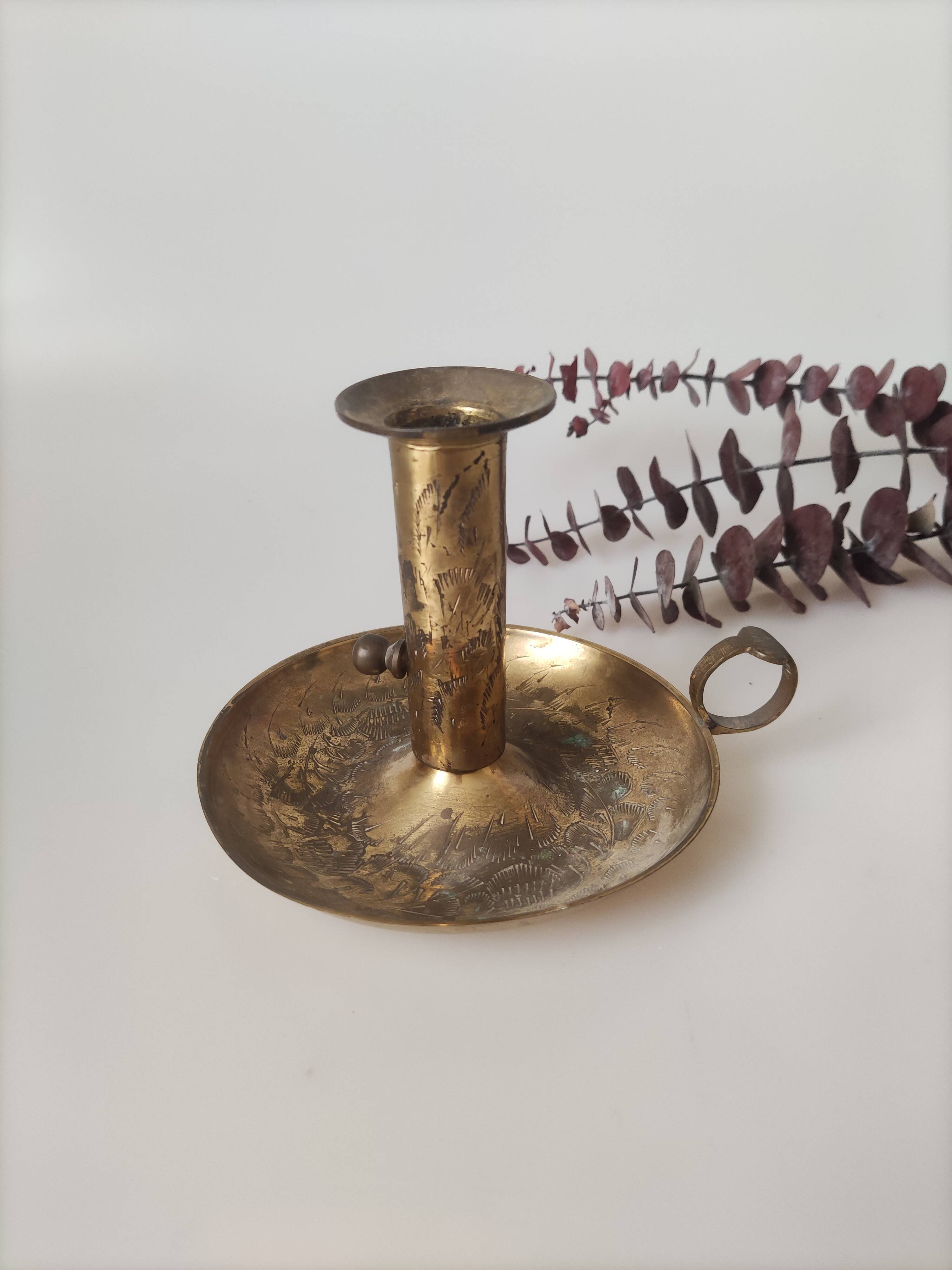 Brass cellar rat candle holder