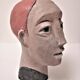 Redheaded boyish woman modeled in earth signed 60/70 years