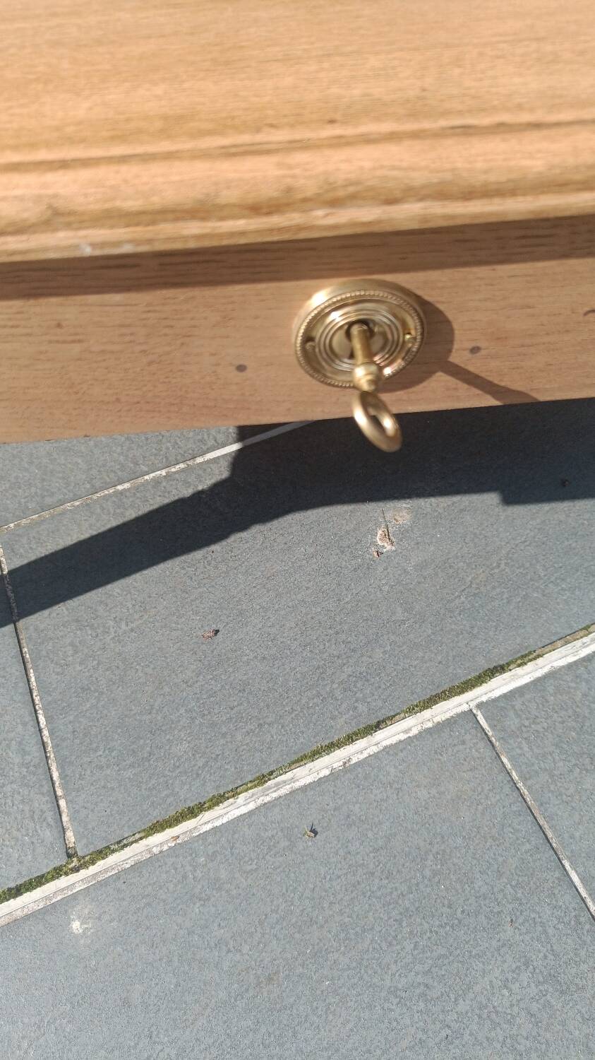 Solid wood coffee table with drawer and original key.