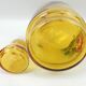 Vintage decanter in cherry yellow glass