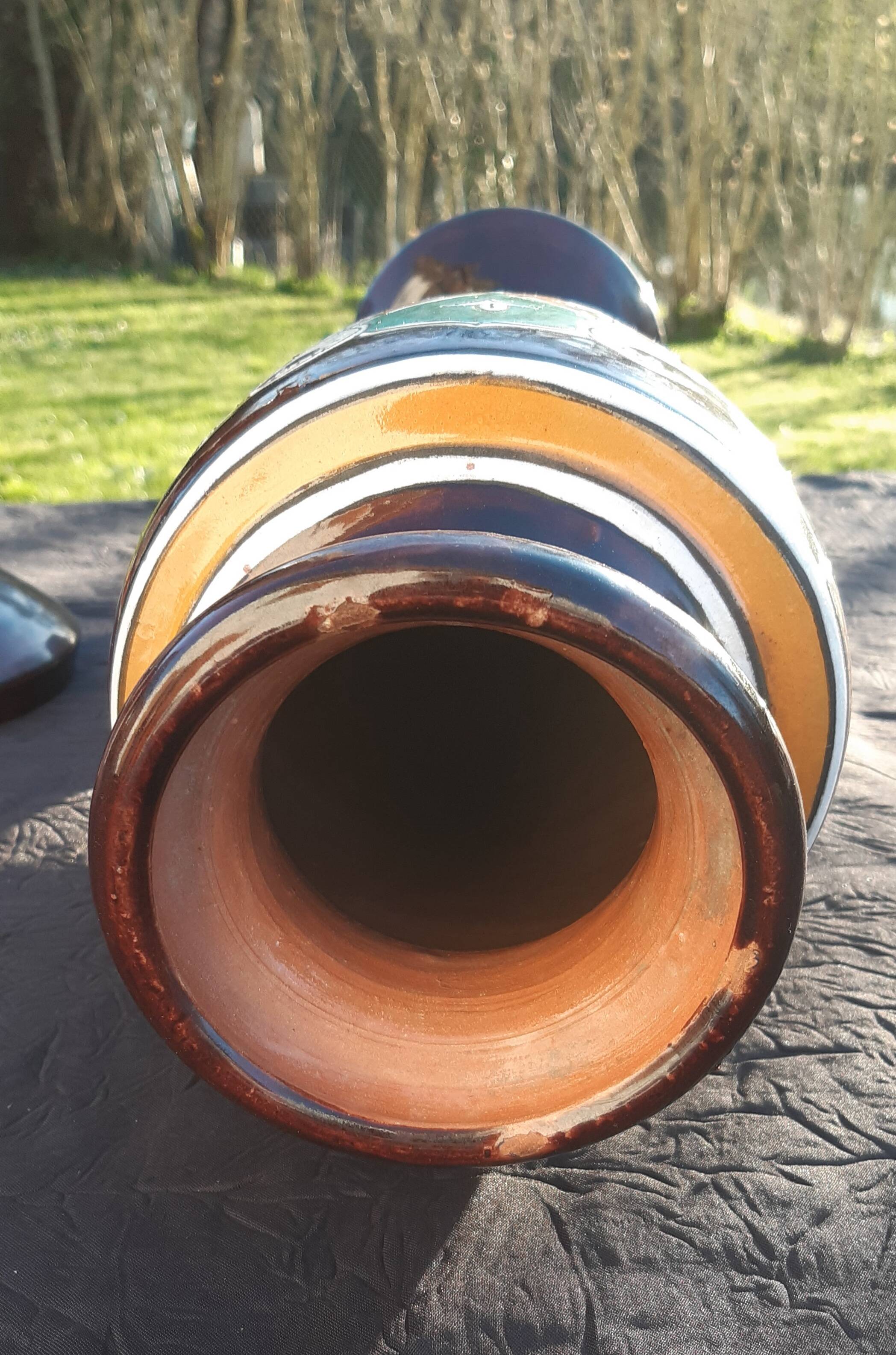 pair of old vases with art deco motifs