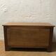 Low oak chest of drawers