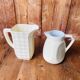 A pair of vintage ceramic jugs from the 1950s.