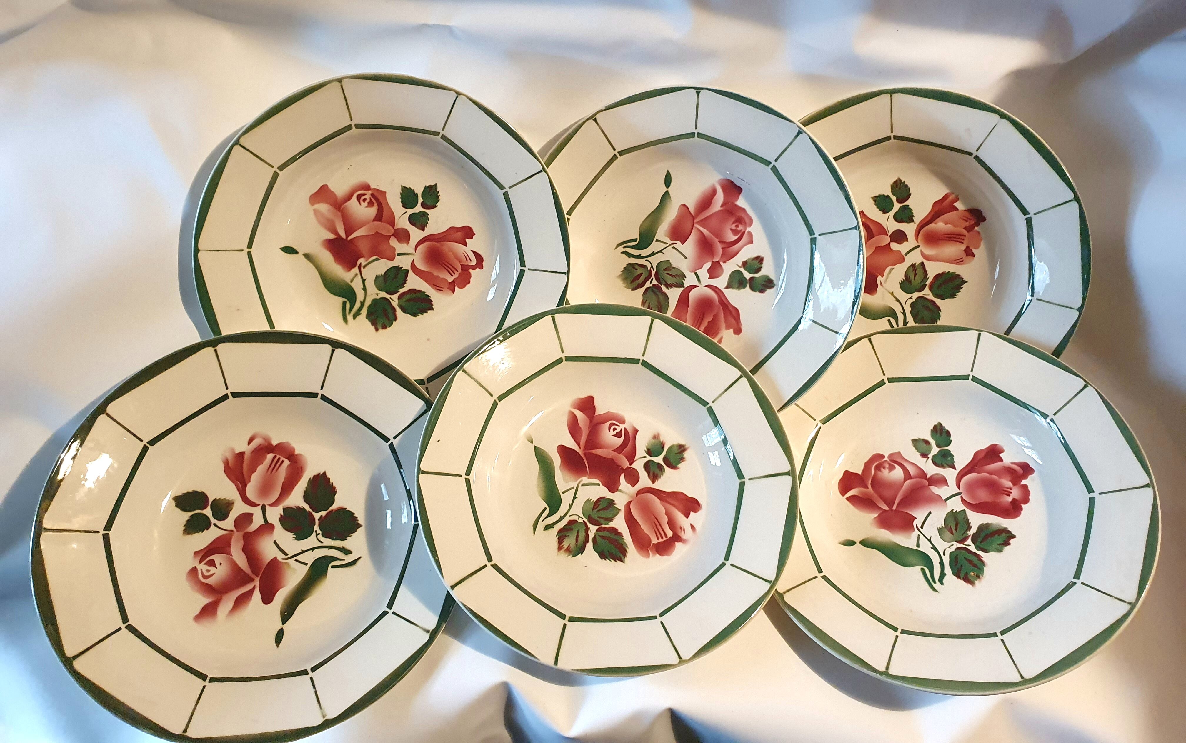 6 hollow plates in faience decor red pinks and green leaves