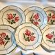 6 hollow plates in faience decor red pinks and green leaves