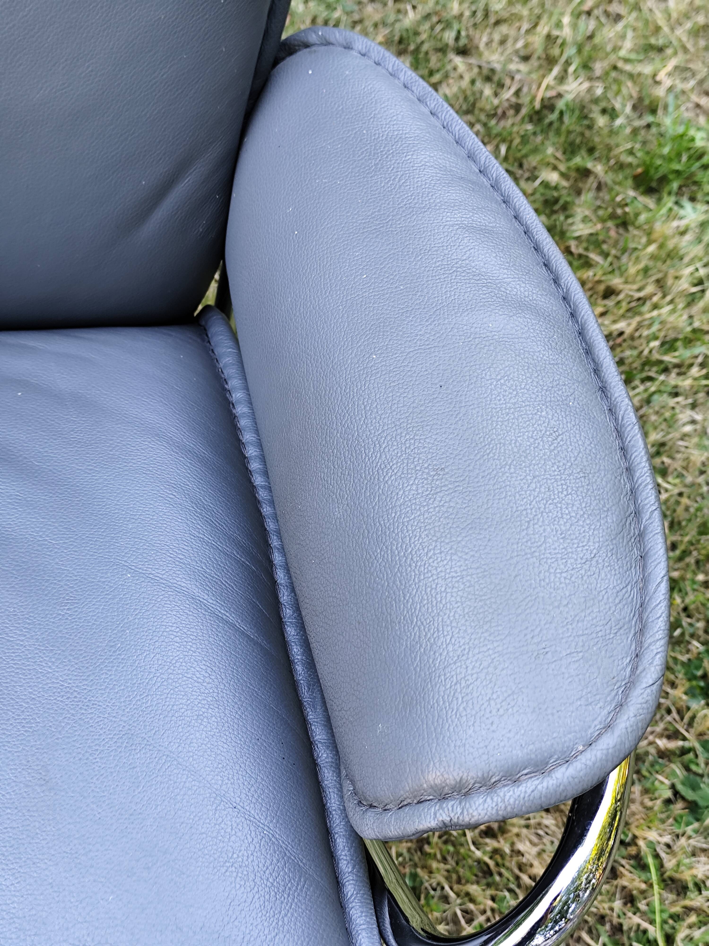 Stressless City armchair with footrest/ottoman, grey