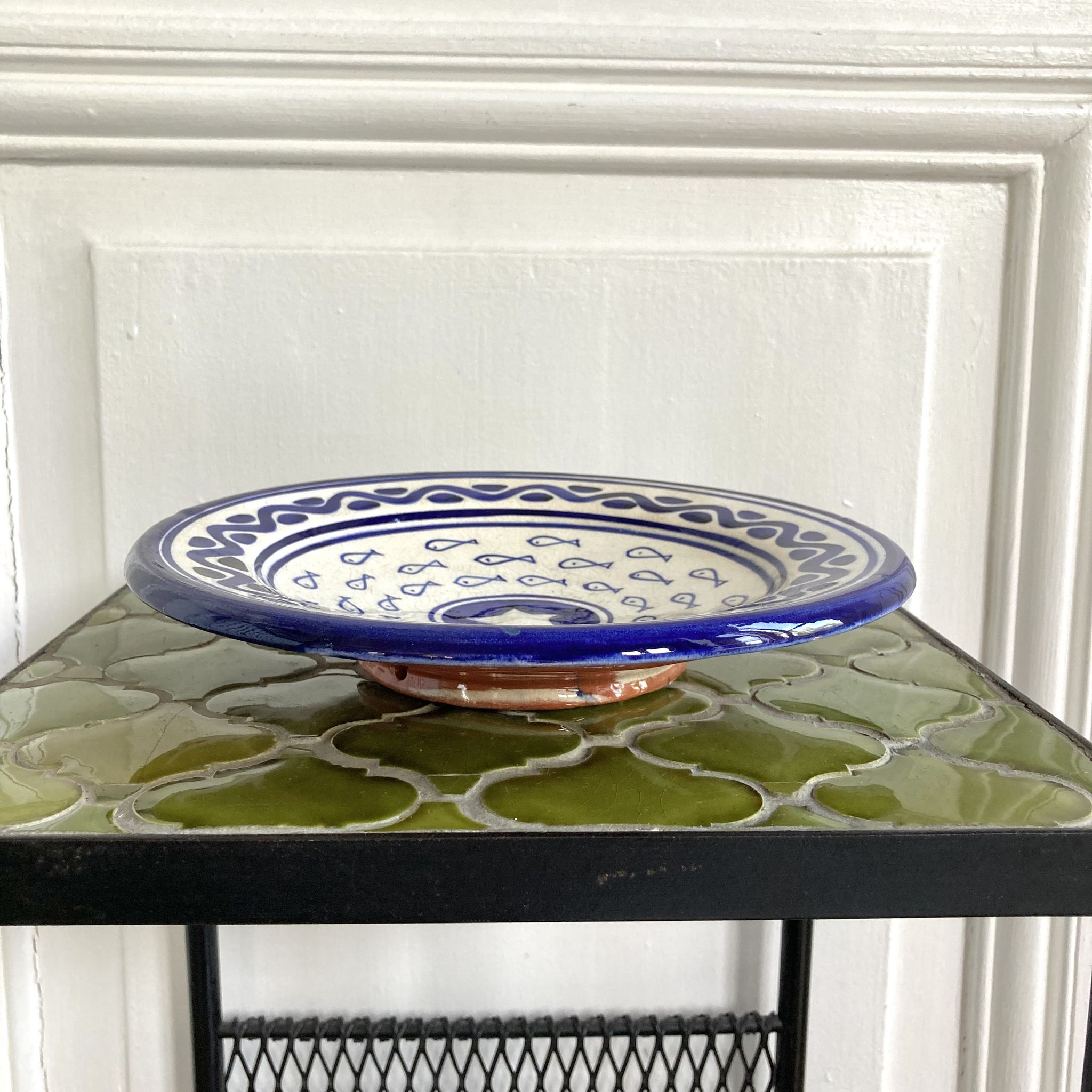 Decorative ceramic deep plate with fish decoration
