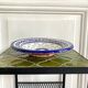 Decorative ceramic deep plate with fish decoration